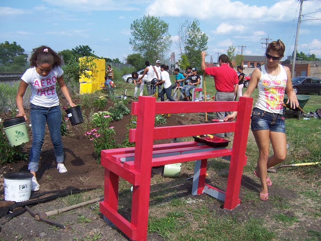Participants working on the bench and garden